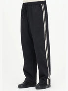 EA7 Emporio Armani Pantaloni Uomo con bande logate Nero 7M000960 AF17160 UC001 EA7 EMPORIO ARMANI
