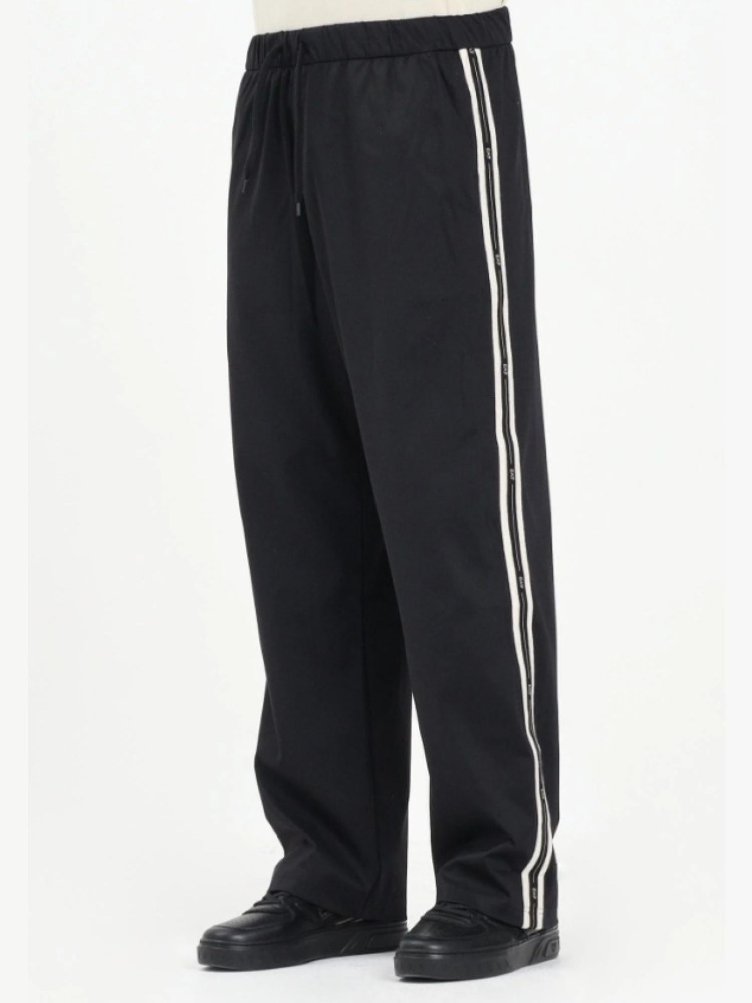 EA7 Emporio Armani Pantaloni Uomo con bande logate Nero 7M000960 AF17160 UC001 EA7 EMPORIO ARMANI